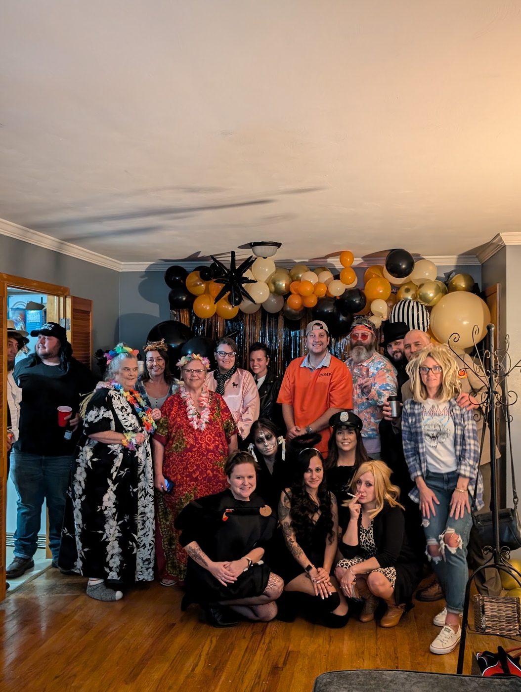 Big group photo of everyone in costume at the end of the night